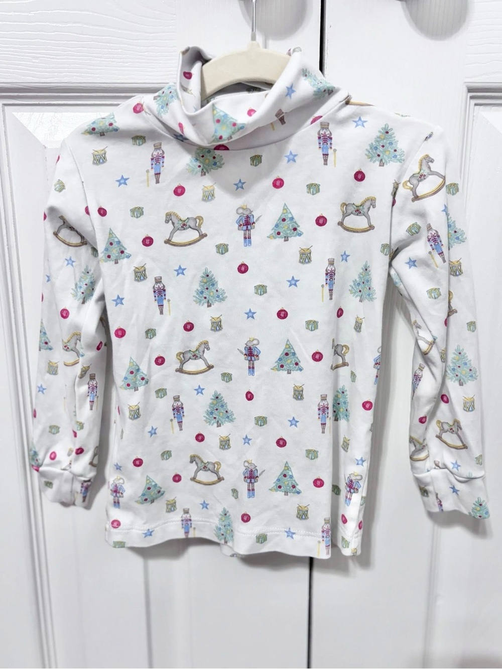 White Holiday Turtleneck Top with Nutcracker & Tree Print